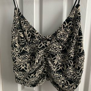 Anthropologie crop lacy cami with peplum back. Never worn, bought for a party.